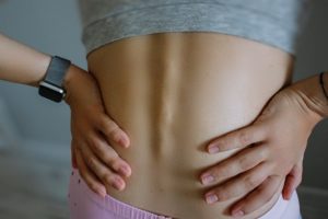 боли в пояснице и массаже