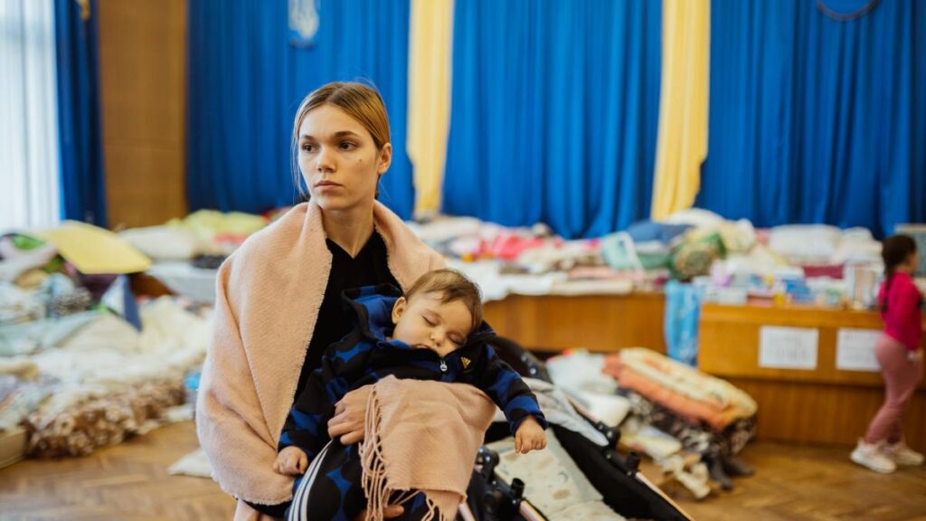 переселенці допомога
