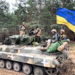 воині на танке