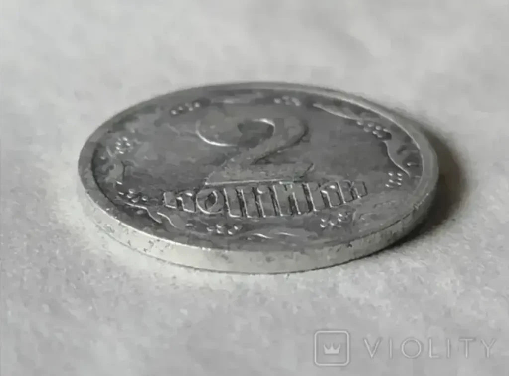 монета