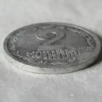 монета