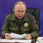 путін