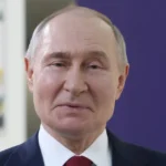 путін