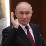 путін