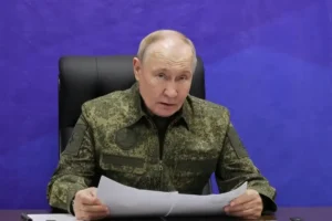 путін