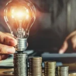 деньги и лампочка