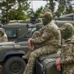 військові